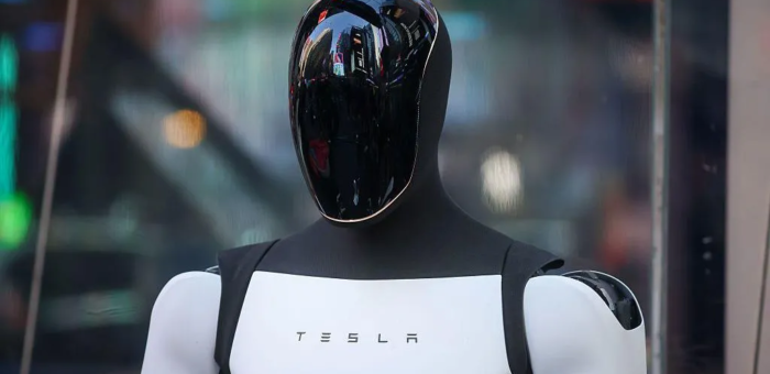 The Humanoid Future: Tesla Bets Big on Optimus Robots to Redefine Manufacturing and Beyond